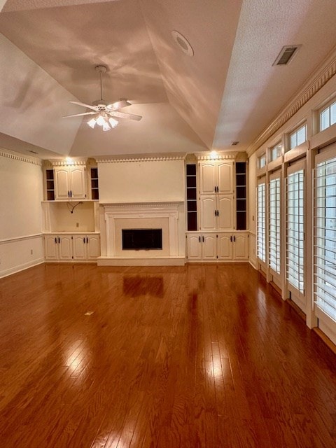 6 Woodmere Dr, Dothan, AL 36305 - unfurnished living room featuring ceiling fan, dark wood finished floors, and a fireplace
