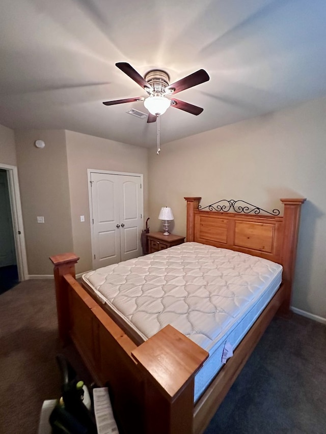 112 Covenant Dr, Dothan, AL 36303 - bedroom with dark carpet, ceiling fan, and a closet