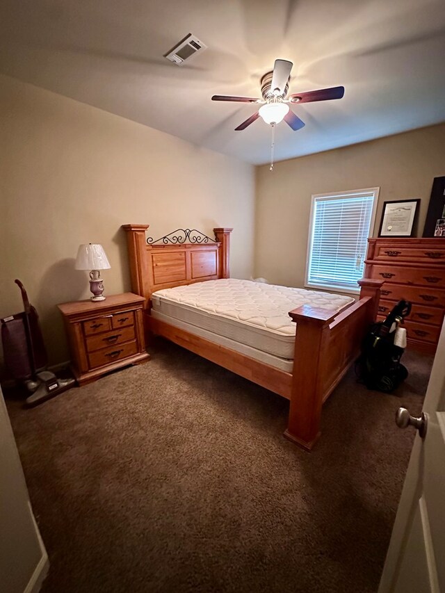 112 Covenant Dr, Dothan, AL 36303 - bedroom with dark carpet and ceiling fan