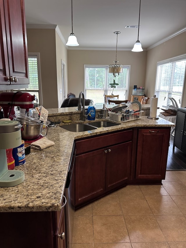 112 Covenant Dr, Dothan, AL 36303 - kitchen with healthy amount of natural light, ornamental molding, pendant lighting, and light tile patterned floors