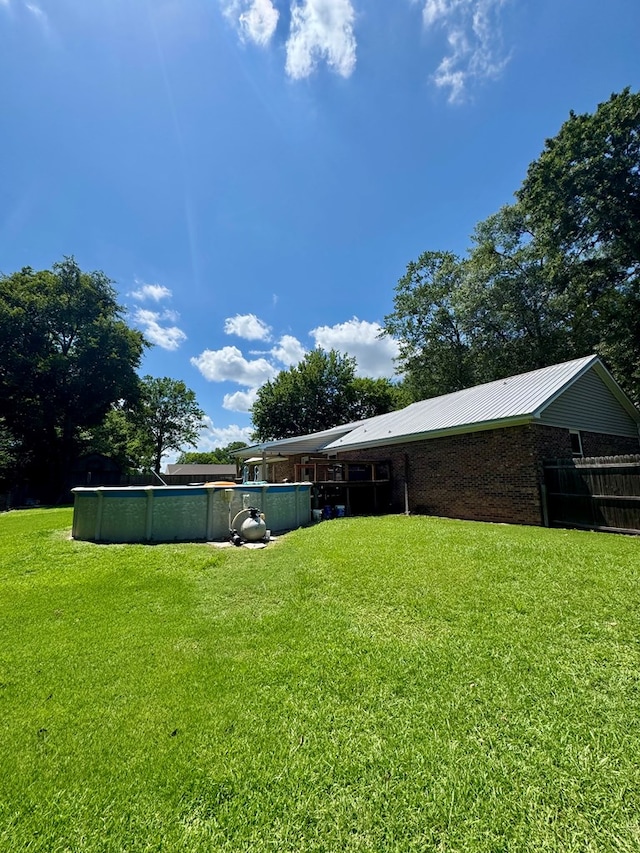 109 Pinehurst Dr, Ashford, AL 36312 - view of grassy yard featuring an outdoor pool