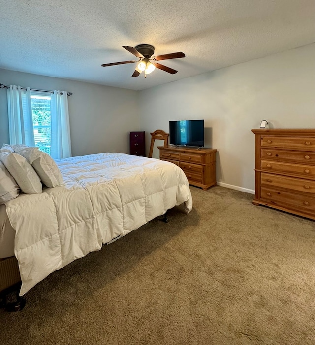 109 Pinehurst Dr, Ashford, AL 36312 - carpeted bedroom featuring ceiling fan and a textured ceiling
