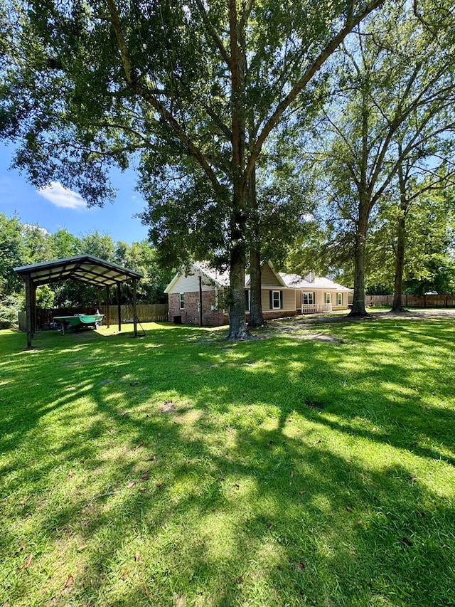 109 Pinehurst Dr, Ashford, AL 36312 - view of yard with a detached carport