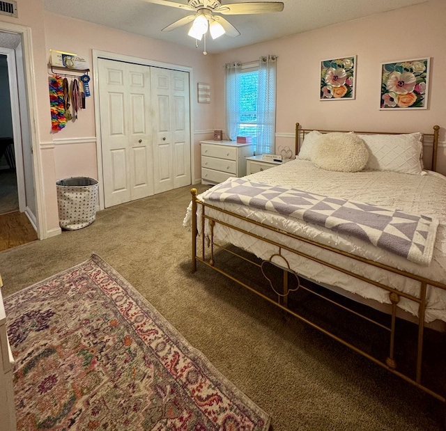 109 Pinehurst Dr, Ashford, AL 36312 - carpeted bedroom featuring a closet and ceiling fan