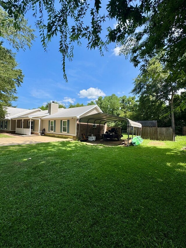 109 Pinehurst Dr, Ashford, AL 36312 - view of yard featuring a carport