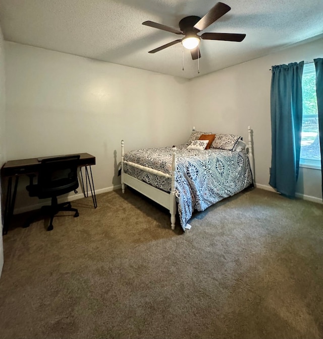 109 Pinehurst Dr, Ashford, AL 36312 - carpeted bedroom featuring a textured ceiling and ceiling fan