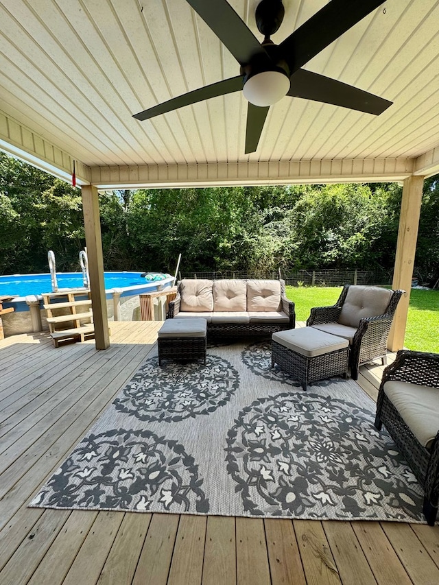 109 Pinehurst Dr, Ashford, AL 36312 - deck with ceiling fan, an outdoor hangout area, and view of scattered trees
