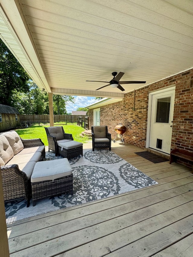 109 Pinehurst Dr, Ashford, AL 36312 - wooden deck featuring a ceiling fan, a fenced backyard, and an outdoor hangout area