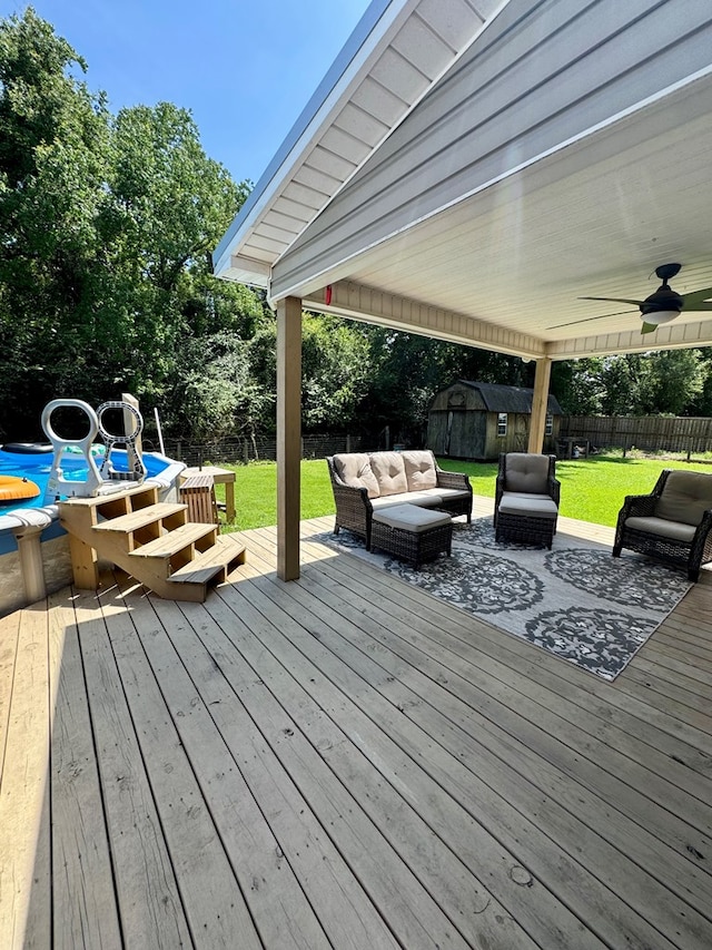 109 Pinehurst Dr, Ashford, AL 36312 - deck featuring an outdoor living space, a shed, a fenced backyard, and ceiling fan