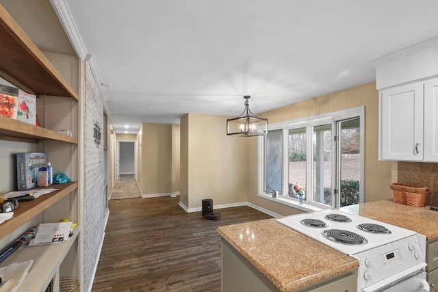 kitchen featuring dark wood-type flooring, hanging light fixtures, electric stove, light stone countertops, and white cabinets