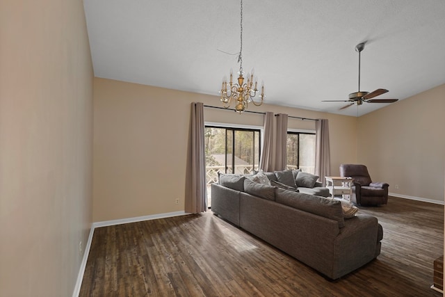 living room with dark hardwood / wood-style flooring, vaulted ceiling, and a textured ceiling