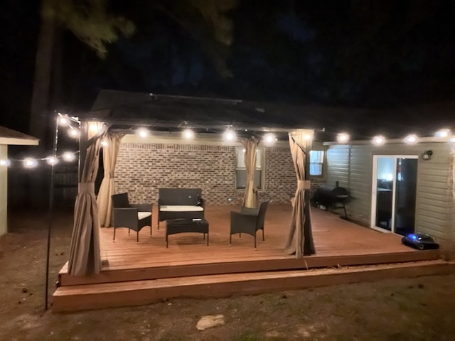 view of deck at night