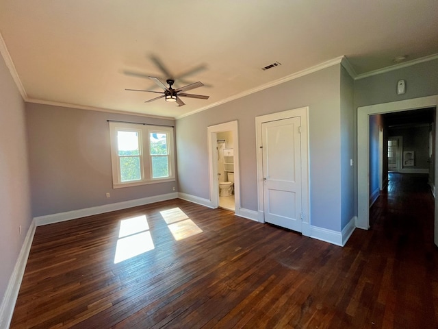 unfurnished bedroom featuring connected bathroom, ceiling fan, crown molding, and dark hardwood / wood-style flooring