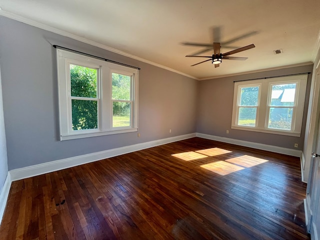 spare room featuring ceiling fan, dark hardwood / wood-style flooring, and ornamental molding