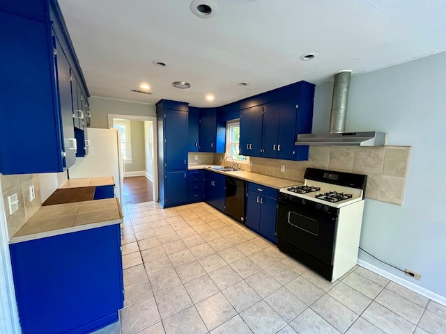 kitchen with ventilation hood, white appliances, sink, and blue cabinets