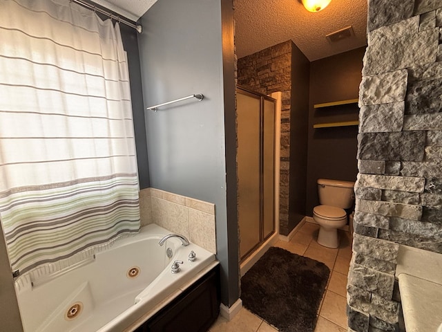 full bath with a shower stall, tile patterned flooring, toilet, a tub with jets, and a textured ceiling