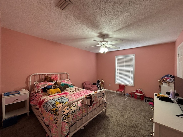carpeted bedroom with a ceiling fan and visible vents