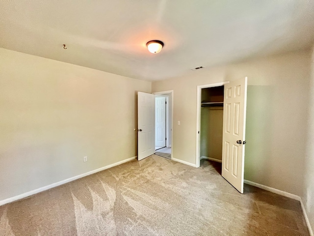 unfurnished bedroom featuring carpet