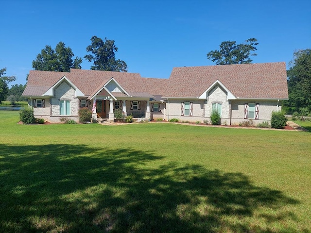 ranch-style house with a front lawn