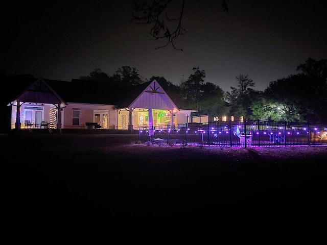 view of back house at night