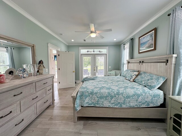 bedroom with access to outside, light hardwood / wood-style flooring, multiple windows, and ceiling fan