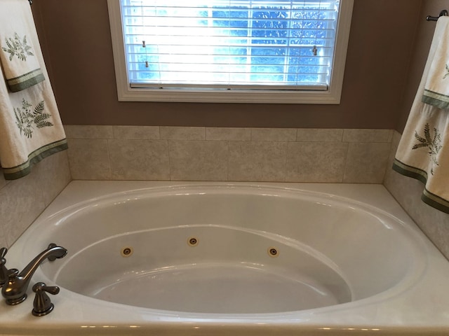 bathroom with a washtub