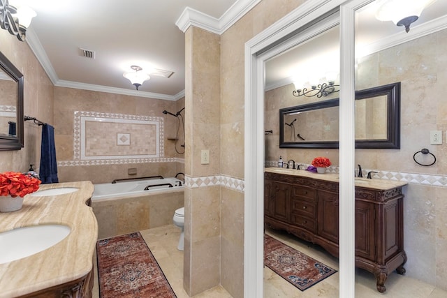 bathroom with vanity, tile walls, ornamental molding, and tiled tub