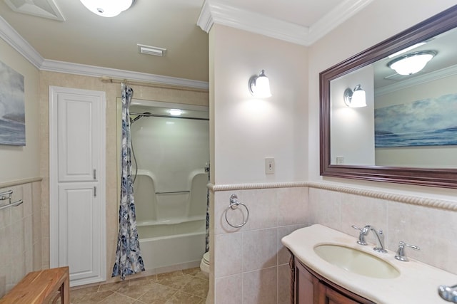 full bathroom with toilet, shower / tub combo with curtain, vanity, tile walls, and ornamental molding