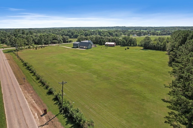 birds eye view of property featuring a rural view