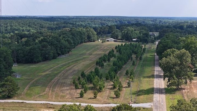 birds eye view of property featuring a rural view