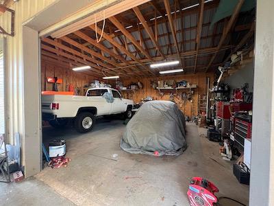 garage with a workshop area