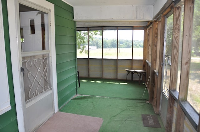 unfurnished sunroom featuring a healthy amount of sunlight