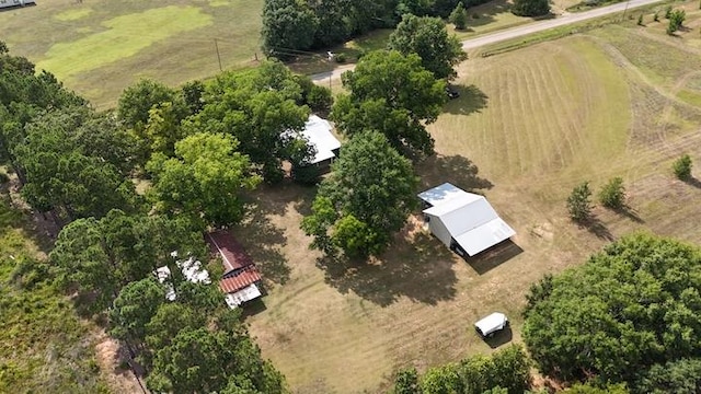 birds eye view of property featuring a rural view