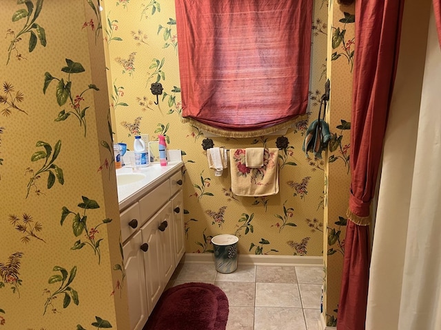 bathroom featuring tile patterned floors and vanity