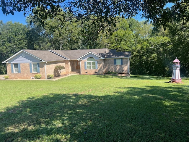 ranch-style home featuring a front yard