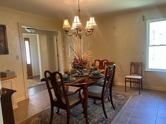 tiled dining area featuring a notable chandelier and crown molding