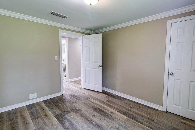 382 Timbers Dr, Dothan, AL 36301 - spare room with baseboards, wood finished floors, and ornamental molding
