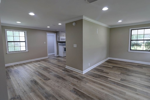 382 Timbers Dr, Dothan, AL 36301 - empty room with ornamental molding, recessed lighting, baseboards, and wood finished floors