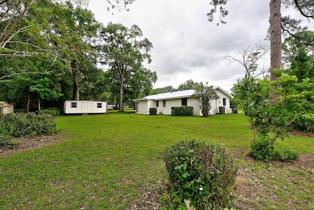 382 Timbers Dr, Dothan, AL 36301 - view of green lawn featuring central AC unit