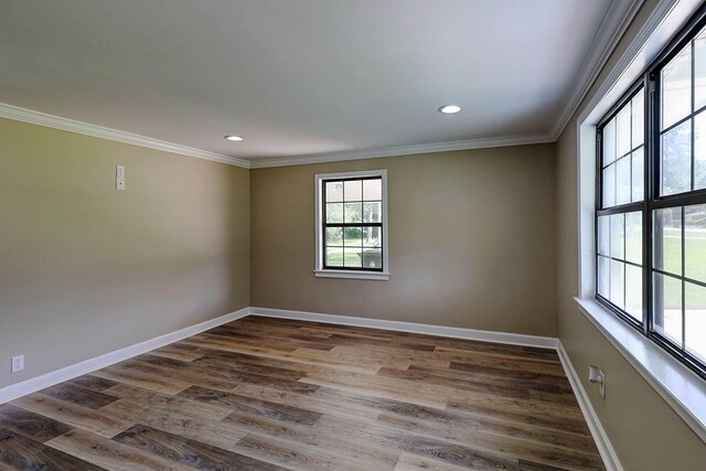 382 Timbers Dr, Dothan, AL 36301 - spare room featuring crown molding, baseboards, dark wood-style flooring, and recessed lighting