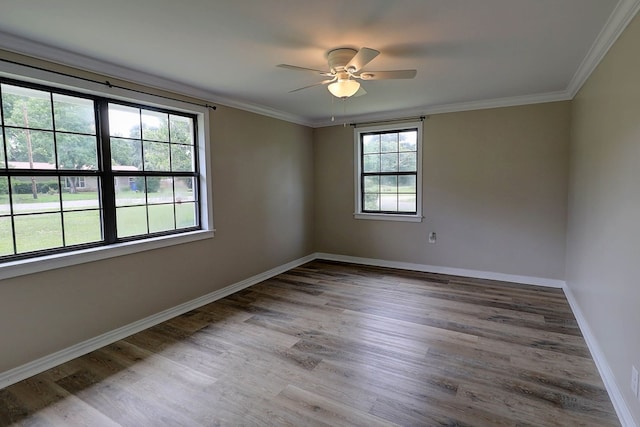 382 Timbers Dr, Dothan, AL 36301 - empty room featuring baseboards, wood finished floors, a ceiling fan, and crown molding