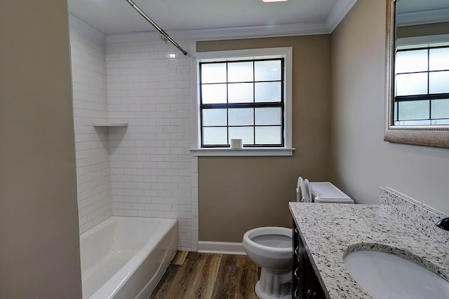 382 Timbers Dr, Dothan, AL 36301 - bathroom with toilet, vanity, wood finished floors, crown molding, and bathtub / shower combination