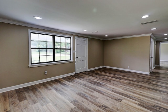 382 Timbers Dr, Dothan, AL 36301 - spare room featuring crown molding, baseboards, wood finished floors, and recessed lighting