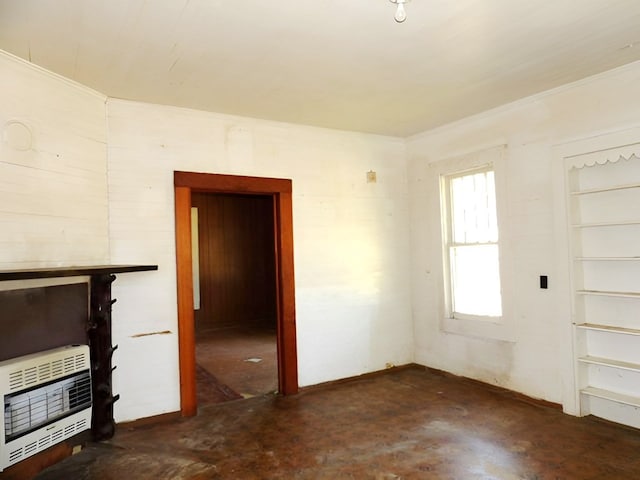 201 Ruth St, Dothan, AL 36303 - unfurnished living room with heating unit, concrete flooring, and baseboards