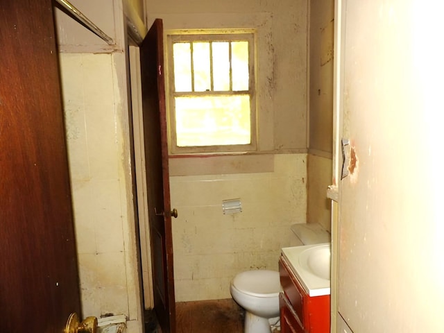 201 Ruth St, Dothan, AL 36303 - half bath with vanity, toilet, and a wainscoted wall
