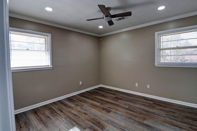 spare room with ceiling fan, crown molding, and dark hardwood / wood-style floors