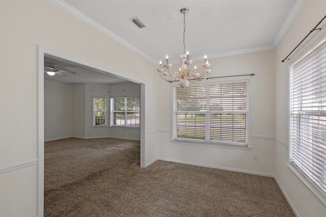 empty room featuring ceiling fan with notable chandelier, carpet floors, and ornamental molding