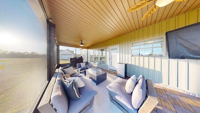 view of patio / terrace featuring ceiling fan and an outdoor living space