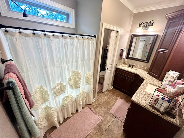 1456 State Highway 134 E, Headland, AL 36345 - full bath featuring vanity, toilet, tile patterned floors, curtained shower, and ornamental molding