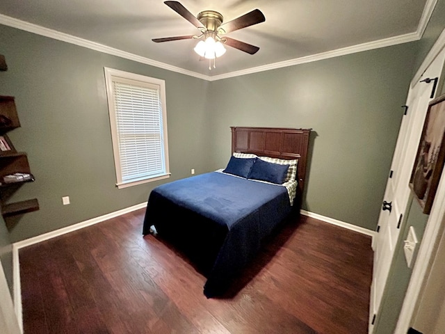 1456 State Highway 134 E, Headland, AL 36345 - bedroom with baseboards, dark wood finished floors, ornamental molding, and ceiling fan
